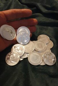 Silver coins used as a financial education lesson for kids