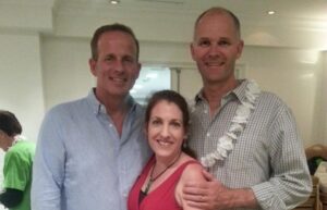 Cathy and Trevor with David T.S. Wood at a network marketing event learning about the network marketing business model