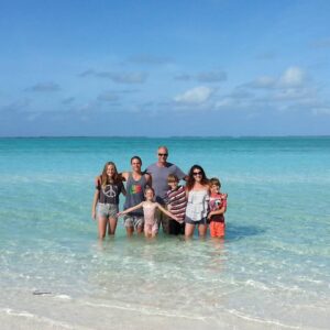 Our family on a beach on the Cocos Keeling Islands during an important chapter of our journey