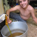 Flynn as a budding young entrepreneur with one of our family business ideas