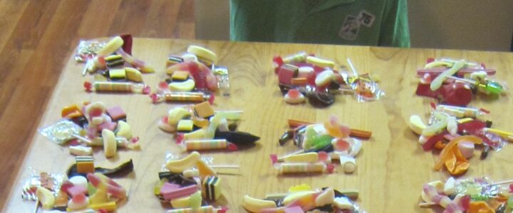 Ways to Earn Money for Students: Chayse Plans a Candy Business Ways to earn money for students shown through Chayse preparing lolly bags for his Candy Man business