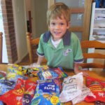 Entrepreneurship ideas for students shown through Chayse bringing home lollies for his business