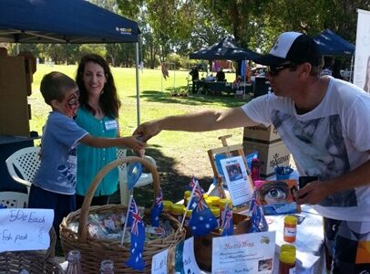 Chayse making a sale at the Burekup Fair as one of the business ideas for young entrepreneurs