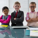 Young kids in suits showing a determined kids mindset for success