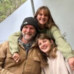 Trevor with daughters Amber and Akaisha in a recent family photo